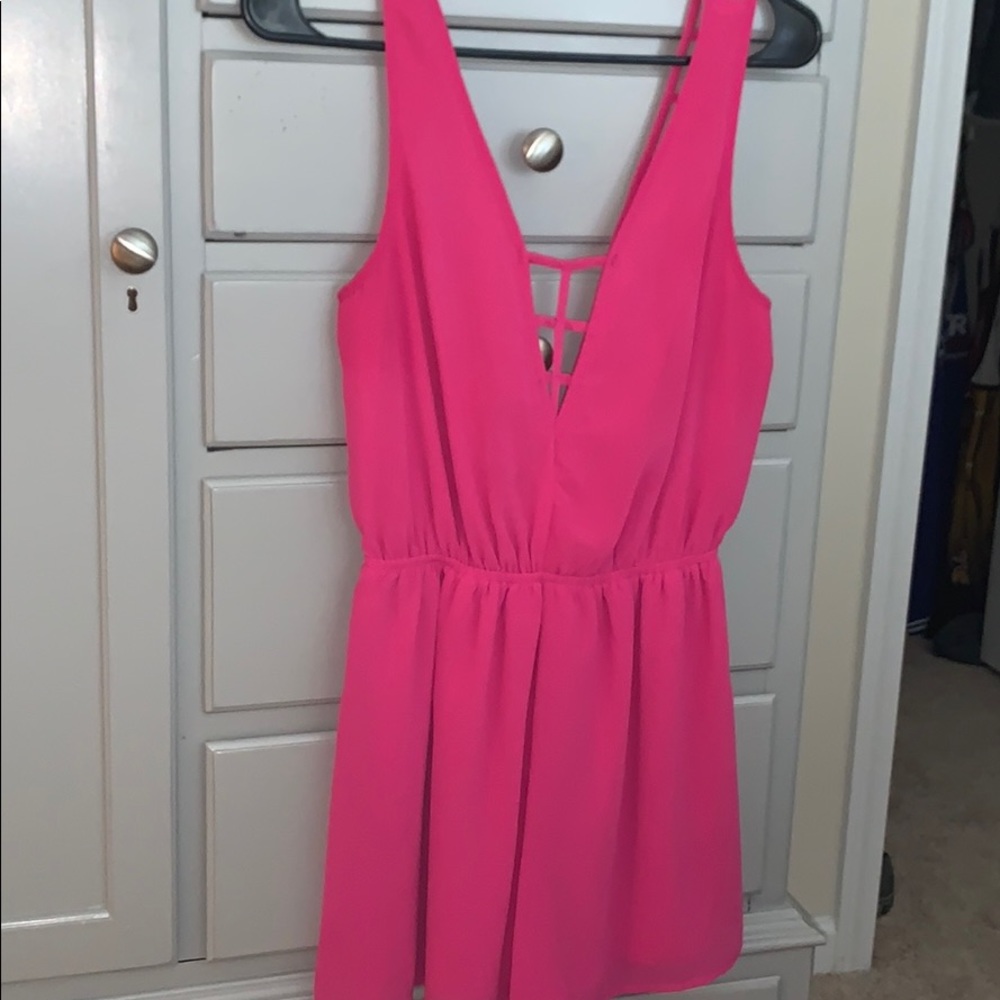 Open back pink romper